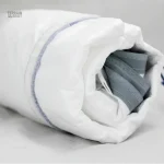 Accessoire de protection pour sac de couchage