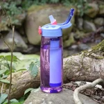 Accessoire de survie : gourde violette filtrante