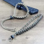 Équipement essentiel : lanière en paracorde réglable