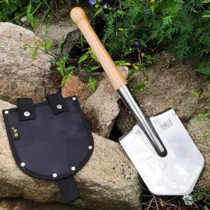 Pelle de survie en acier inoxydable et son étui pratique