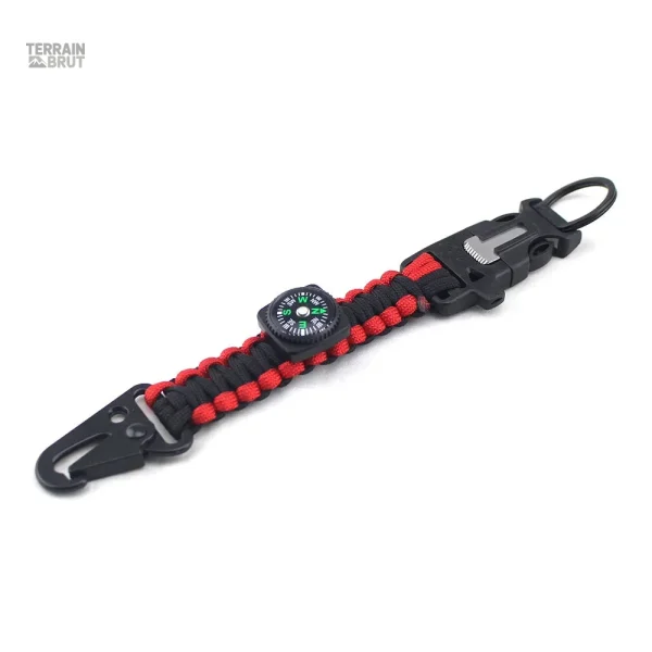 Boussole intégrée dans un porte-clés de survie